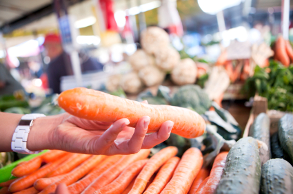 woman holding carrot